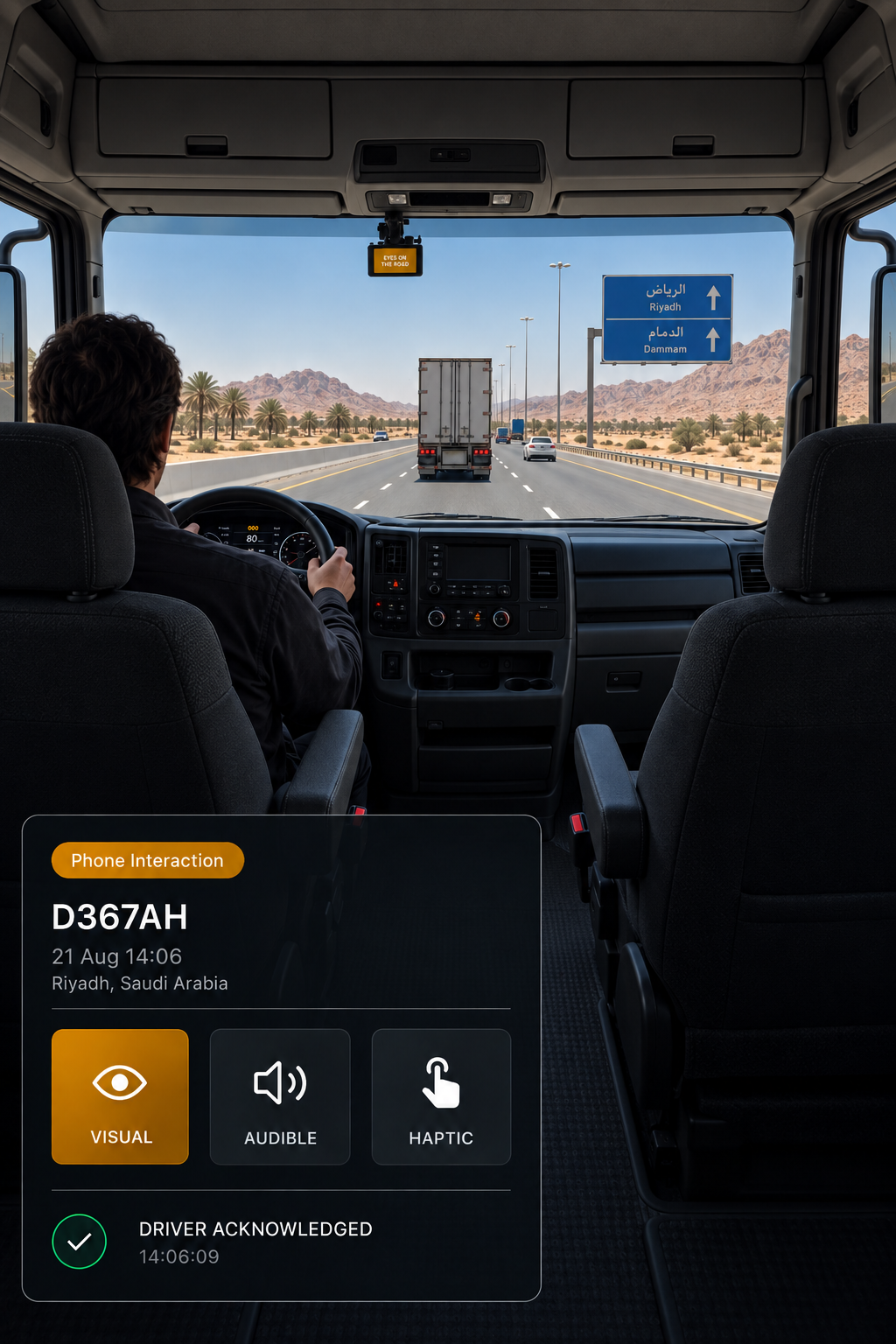 Photograph: a truck cab interior in daylight, the in-cab display lit on the dash, driver in frame from the side. Portrait 3:4, dark and cool, room at the top for a heading, no text in the artwork.