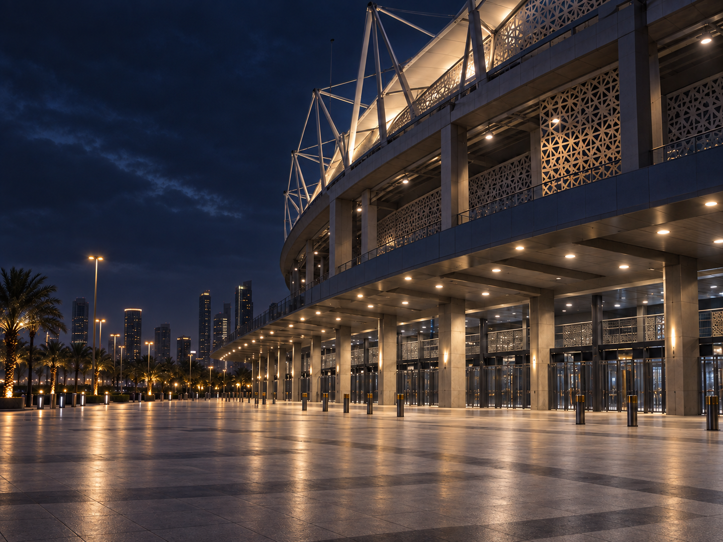 Photograph: a stadium concourse before doors, lit and empty. Dark and cool, no text in the artwork.