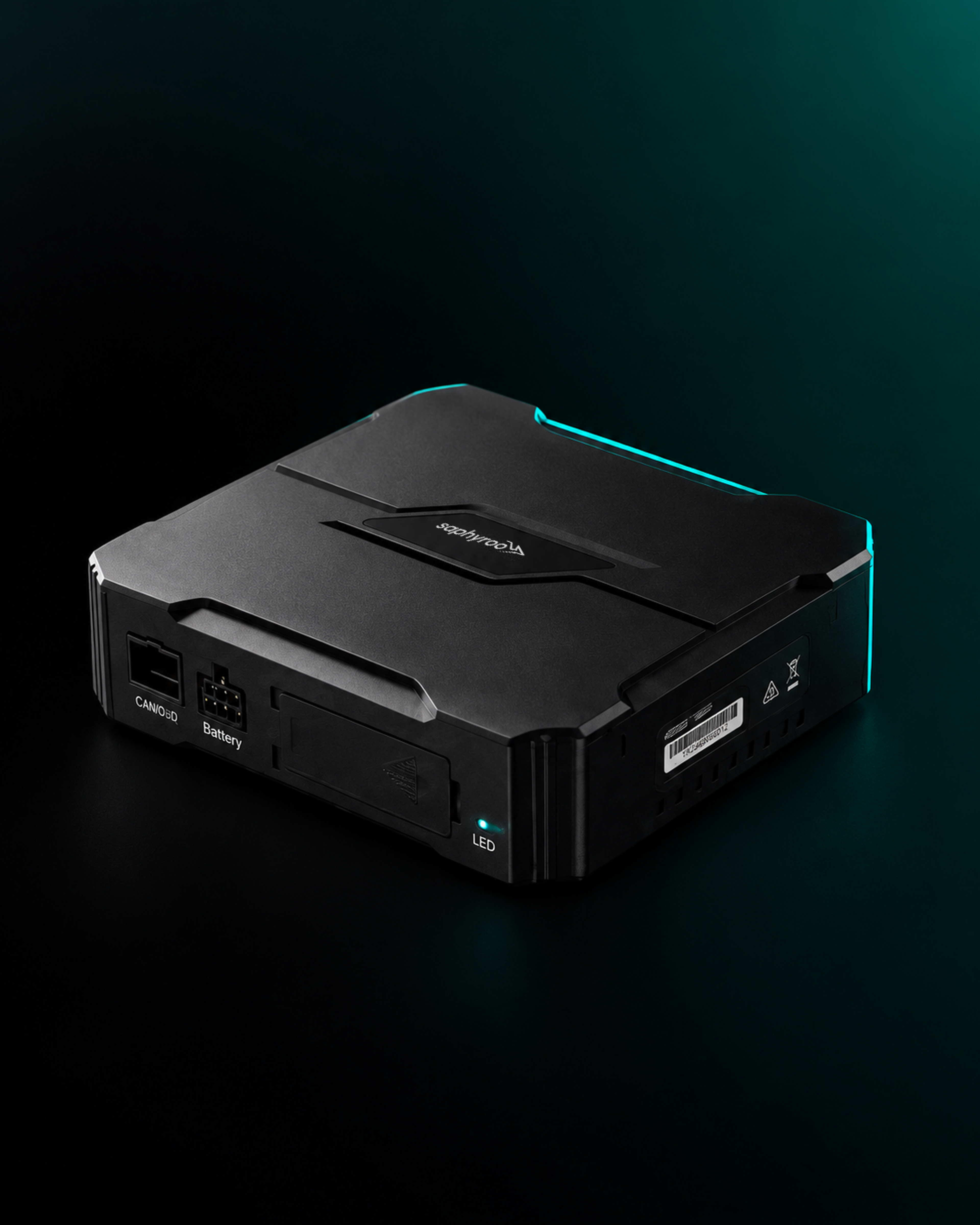 GPS vehicle tracker on a plain light ground, three-quarter view, product centred with air around it.