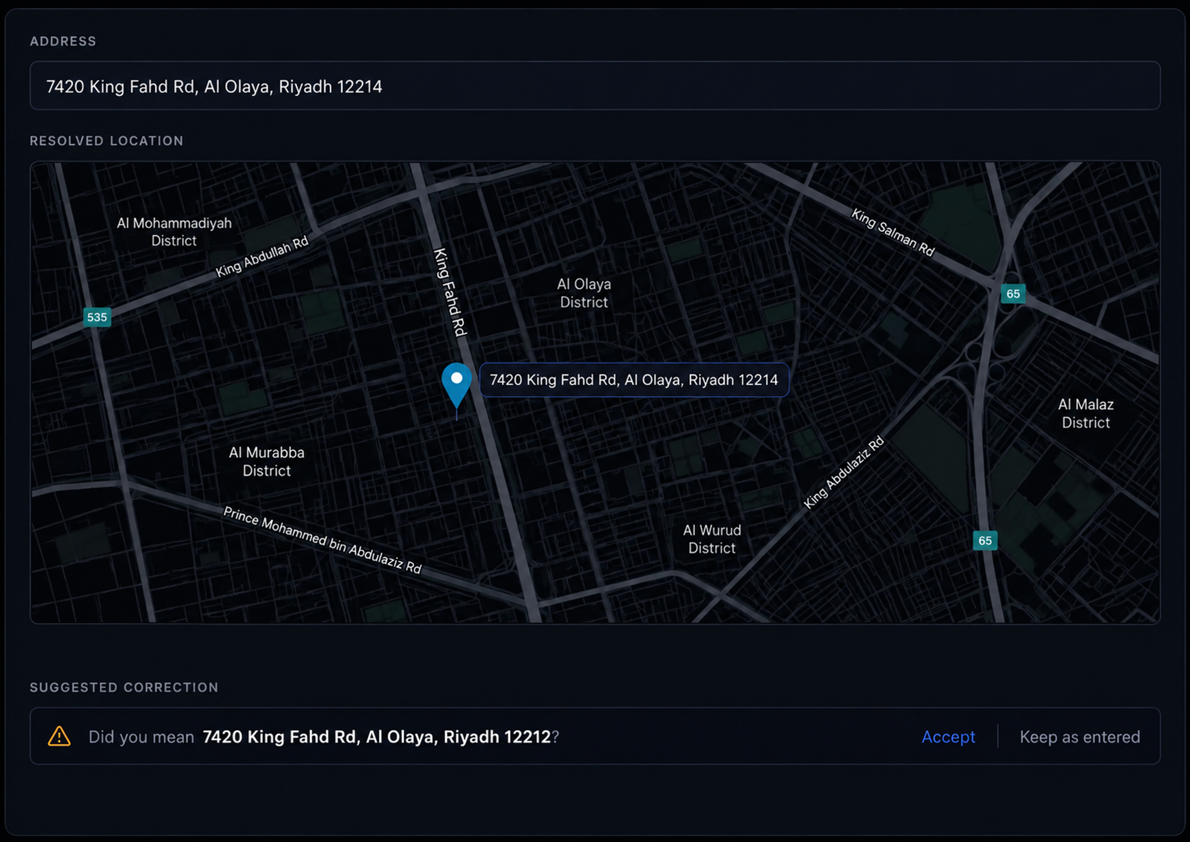 Address validation panel with the resolved pin and the suggested correction. 16:9, dark UI.