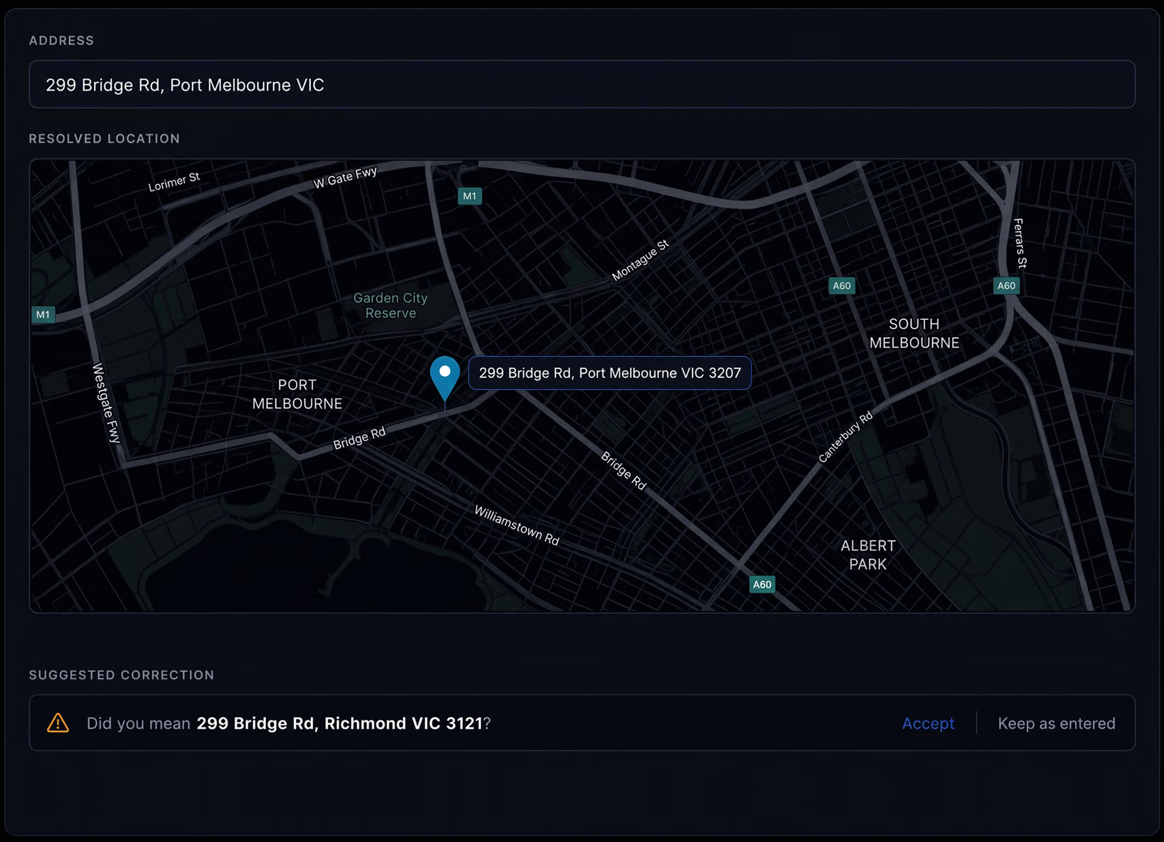 Address validation panel with the resolved pin and the suggested correction. 16:9, dark UI.